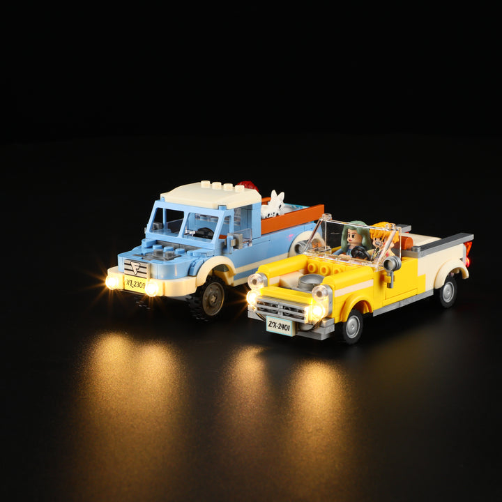 Close-up of classic cars parked at Lumibricks Night Glow Drive-In L9081 under LED lights